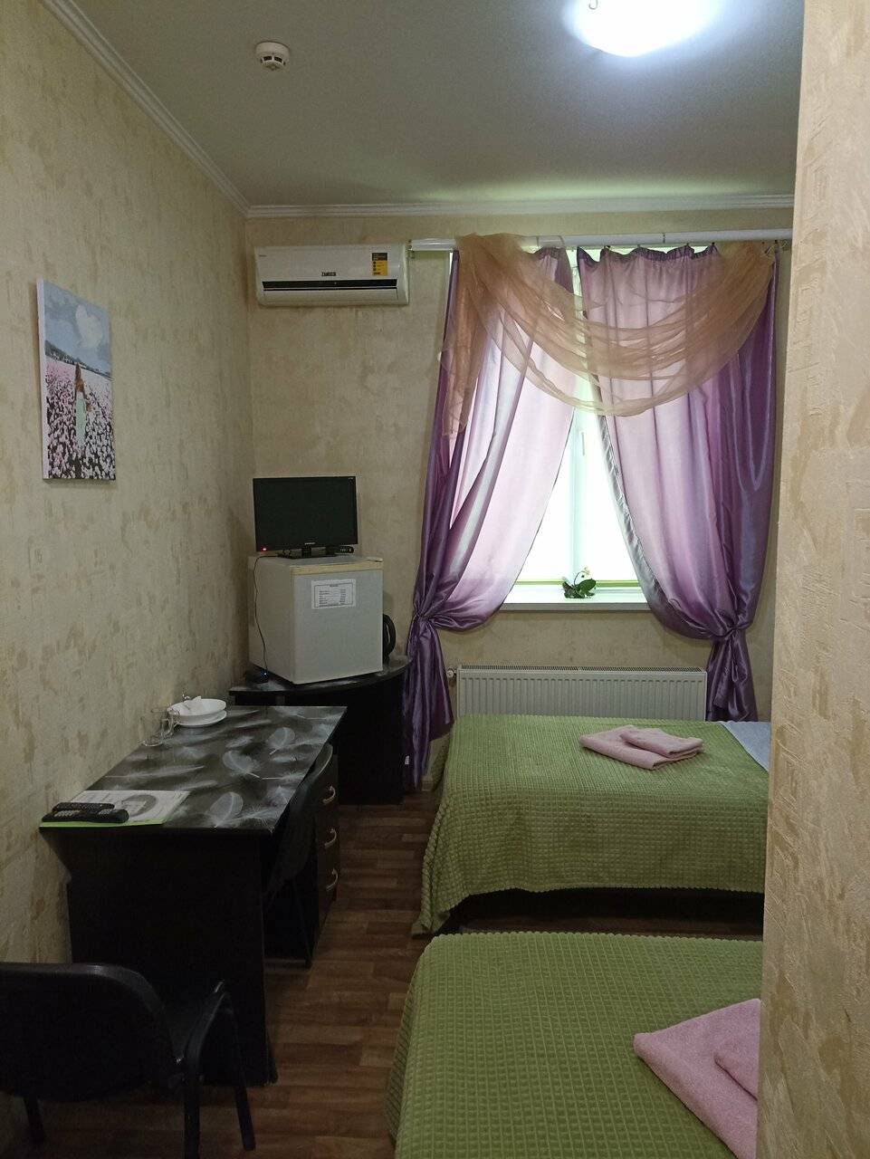 Фотографии номера Двухместный номер с 2 отдельными кроватями в Гостинице Надежда Таганрог